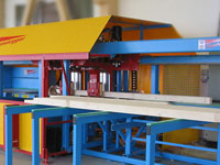 Универсальный домостроительный центр с ЧПУ Hundegger BHM-2, стол для выгрузки деталей с 5 опорами